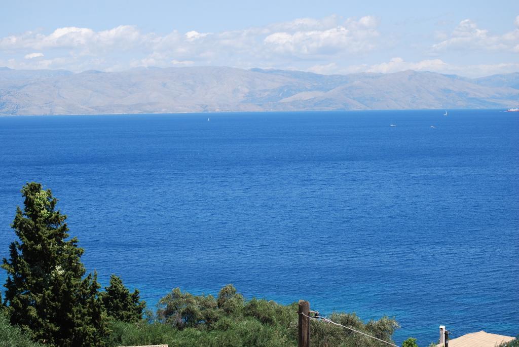 Brentanos Apartments - A - View Of Paradise Gastouri  Rom bilde